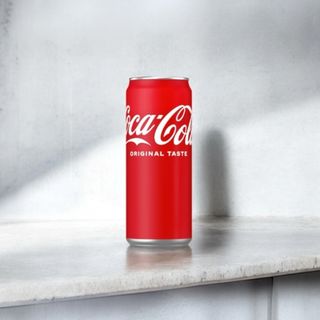 Напій Coca-Cola (0,33л)