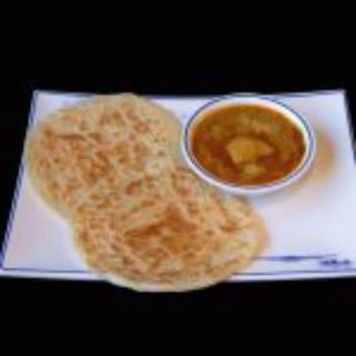 Roti con curry pollo 