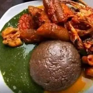 Amala served with ewedu mixed with pomo