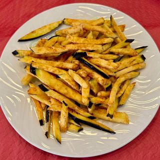 Berenjenas fritas  con miel de caña