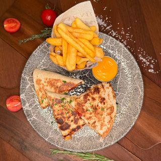 Chicken quesadilla with melted cheddar