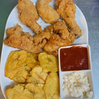 Pica pollo con plátanos fritos 