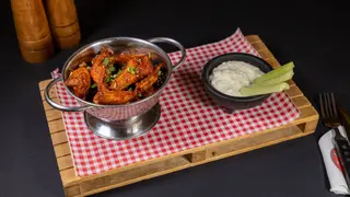 Alitas con louisiana