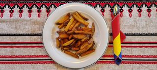 Cartofii prăjiți ai casei cu parmezan