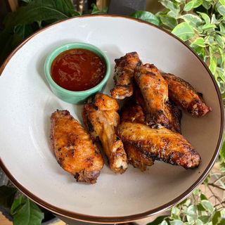 Запечені курячі крила (300/50г)