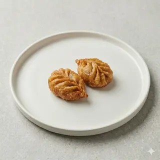 Momos  fritos carne