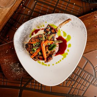 Pork tomahawk & smoked aubergine