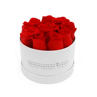 Caja redonda con 9-10 rosas rojas frescas 