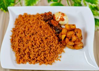 Jollof rice + Plantain + 2beef +egg