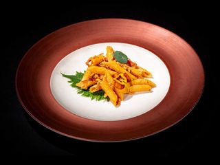 Penne con panna speck e pomodoro