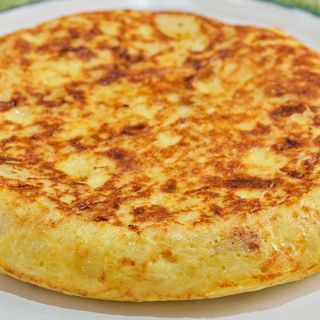 Tostada española tomate y tortilla de patata