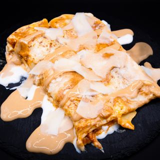 Plato Caliente De Canelones De Carne Mechada