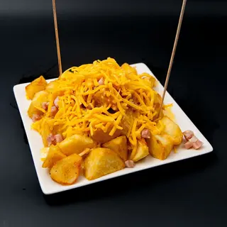Tapas Bravas Cheddar Y Bacon