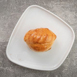 Пирожок с капустой печеный