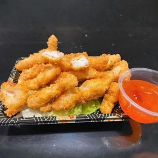 Pescado blanco rebozado con salsa