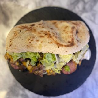 L’IMPERATORE (MAXI PANINO PANPINSA MANZO  500 GR. C.A. + PATATE AL FORNO) 