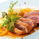 100. Pato a la Naranja