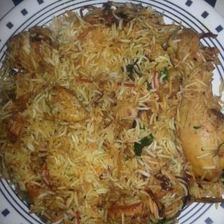 Chicken Biryani served with gravy