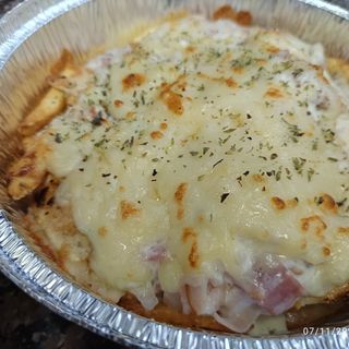 Ración de pollo gratinado a la carbonara 