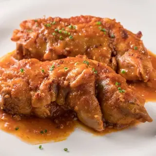 Pies De Cerdo Con Guarnición