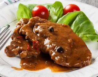 Cote de Porc au Poivre Vert