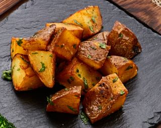 Картопля запечена з зеленню (150г)