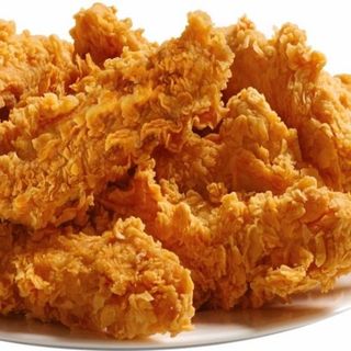 Pollo a la broaster  1/2  pollo (4 piezas) con guarnición