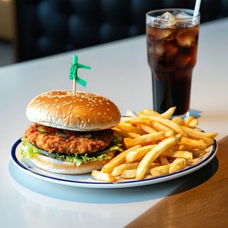 1 Burger + 2 Pieces Of Chicken + Chips