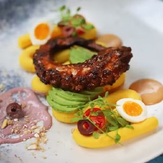 De pulpo brasa y toques de chimichurri