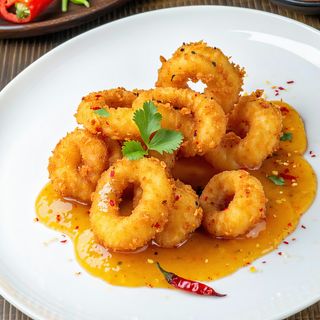 Калмари в пикантен манго сос