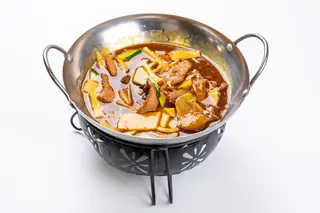 132 Padella di fuoco con manzo piccante