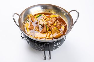 132 Padella di fuoco con manzo piccante
