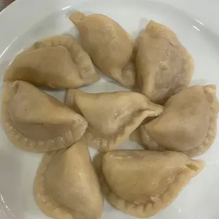15. Raviolis al vapor (8 uds.)