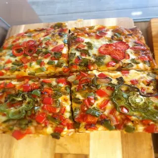 Pizza verdura recapte (porción)