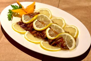 Pato con salsa de limón