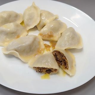 Pierogi z kapustą i pieczarkami 8 szt