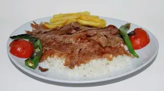 Beef shawarma, flovi.pilav ustu  et