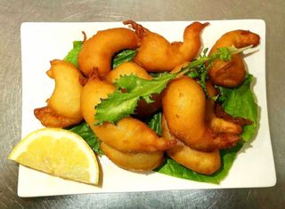 99. Gamberi fritti con pastella