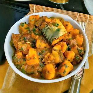 Delicious veggie porridge yam and potatoes with fried panla/meat