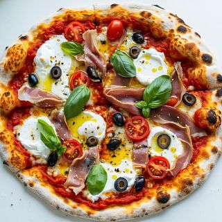 Burrata fondente, acciughe di Cantabrico e olive taggiasche