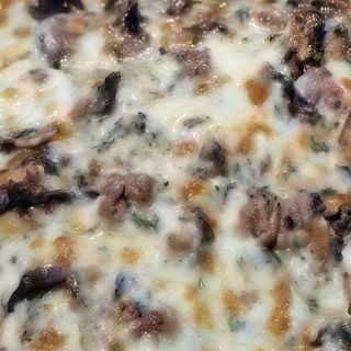 Pizza porcini e salsa di tartufo