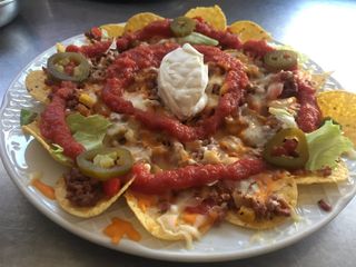 Nacho Mexi Mundo con ternera desmenuzado