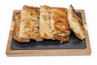 Pan de cristal con tomate y aceite de oliva