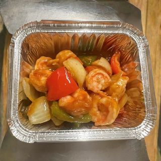 Gamberi con salsa piccante e vedure