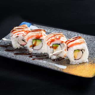 76.Uramaki de cangrejo, aguacate, salmón flameado (4 uds.)