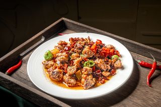 50. Pollo piccante con ossa