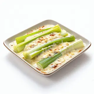 Puerros De Fresno Gratinados Con Crema De Queso De Valdeón