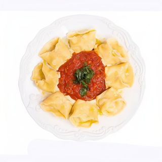 Ravioli de carne con salsa Bolognese