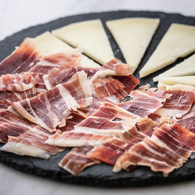 1/2 Tostada tajamar aceite jamón queso curado