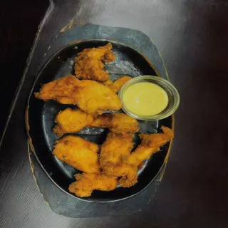 Tiras De Pollo Macerado (7 Uds.)